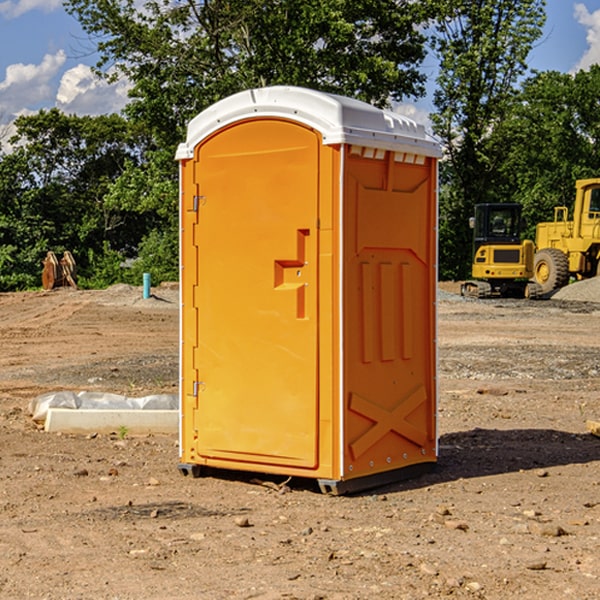 what is the cost difference between standard and deluxe portable restroom rentals in Highland Arkansas